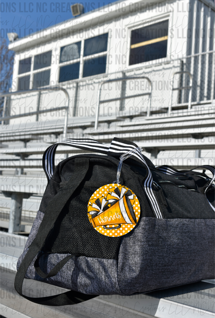 Megáfono con etiqueta para bolsa con pompón